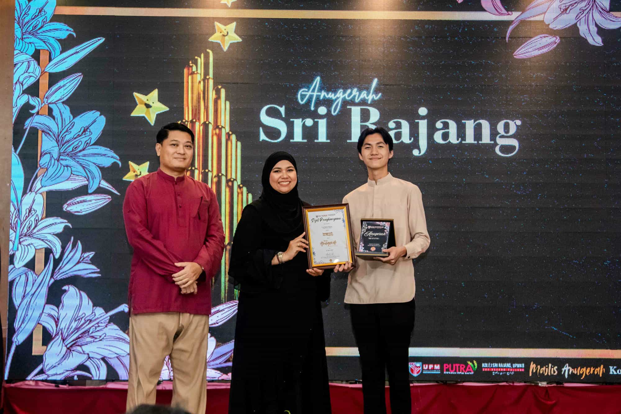 A person receiving an award