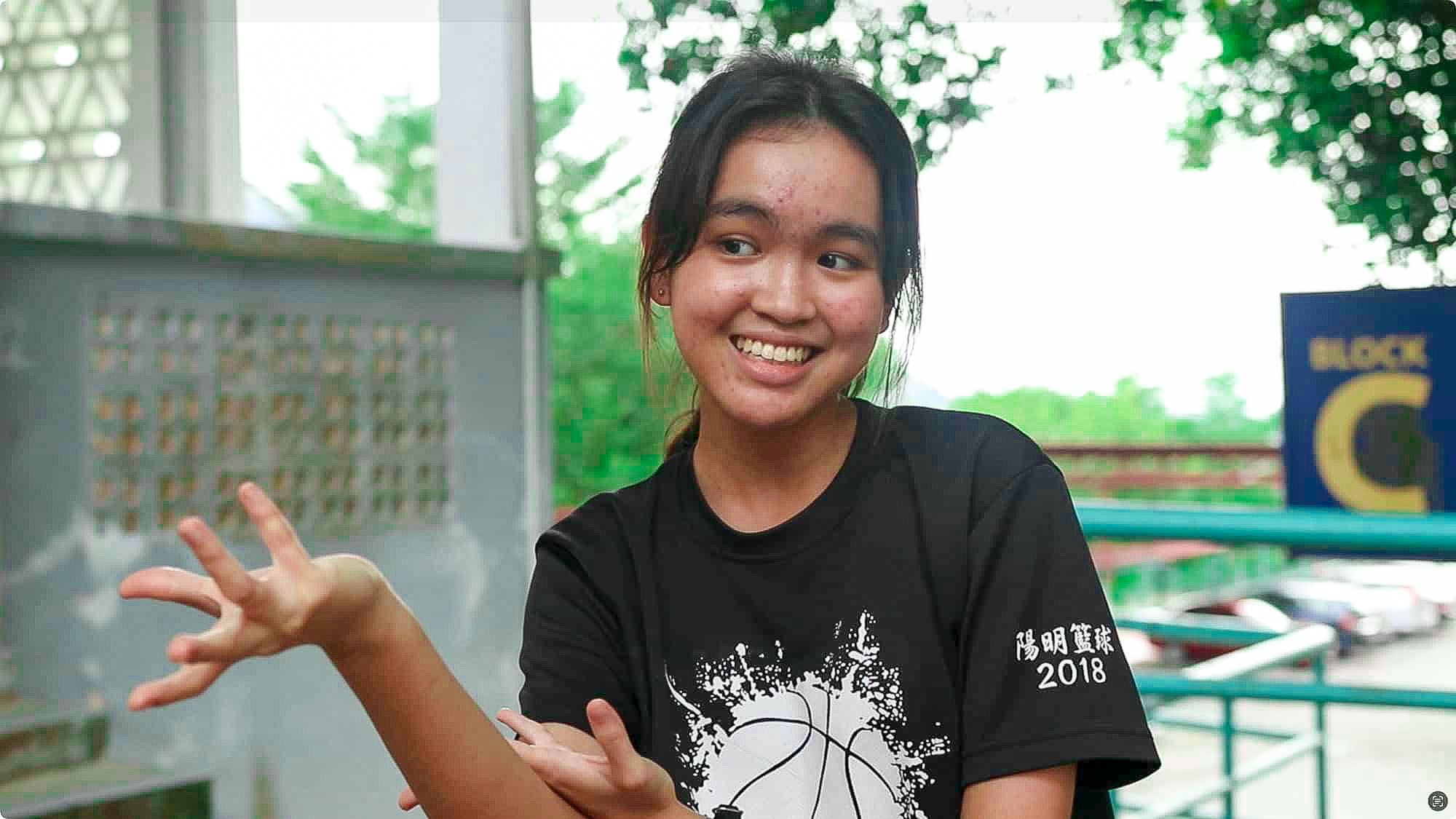 A person speaking towards a camera